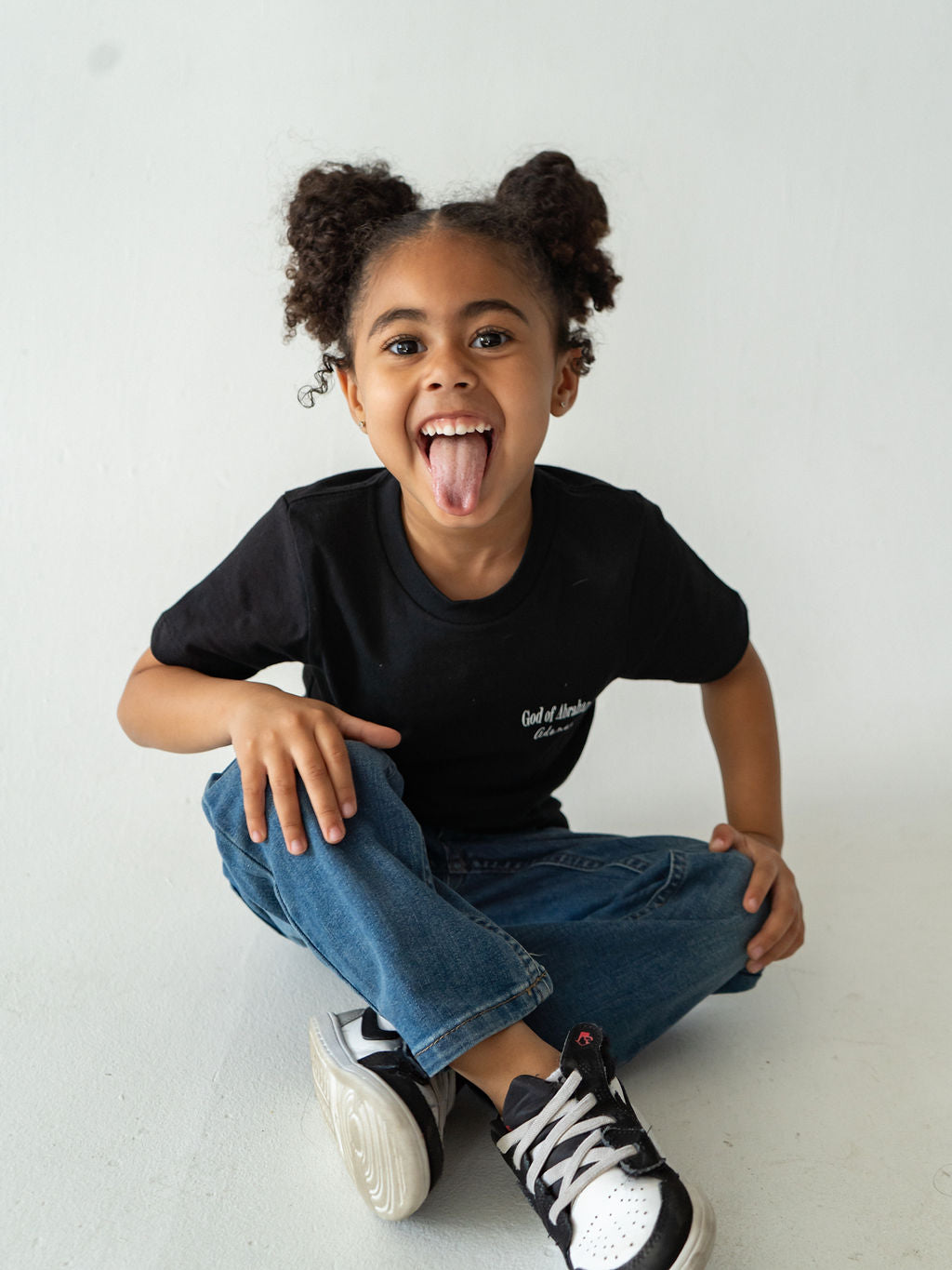 Black organic t-shirt  featuring "Before I Formed You" from Jeremiah 1:5, reminding every child they are known by God and created with purpose.