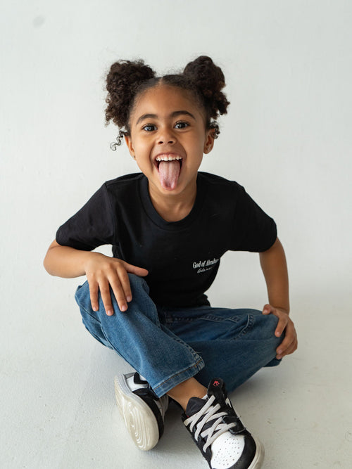 Black organic t-shirt  featuring "Before I Formed You" from Jeremiah 1:5, reminding every child they are known by God and created with purpose.