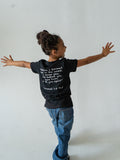 Black organic t-shirt  featuring "Before I Formed You" from Jeremiah 1:5, reminding every child they are known by God and created with purpose.